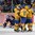 HELSINKI, FINLAND - JANUARY 5: Sweden's Adrian Kempe #29, Gustav Forsling #8 and William Lagesson #3 celebrate with linemates after a first period goal against USA's Alex Nedeljkovic #31 during bronze medal game action at the 2016 IIHF World Junior Championship. (Photo by Andre Ringuette/HHOF-IIHF Images)

